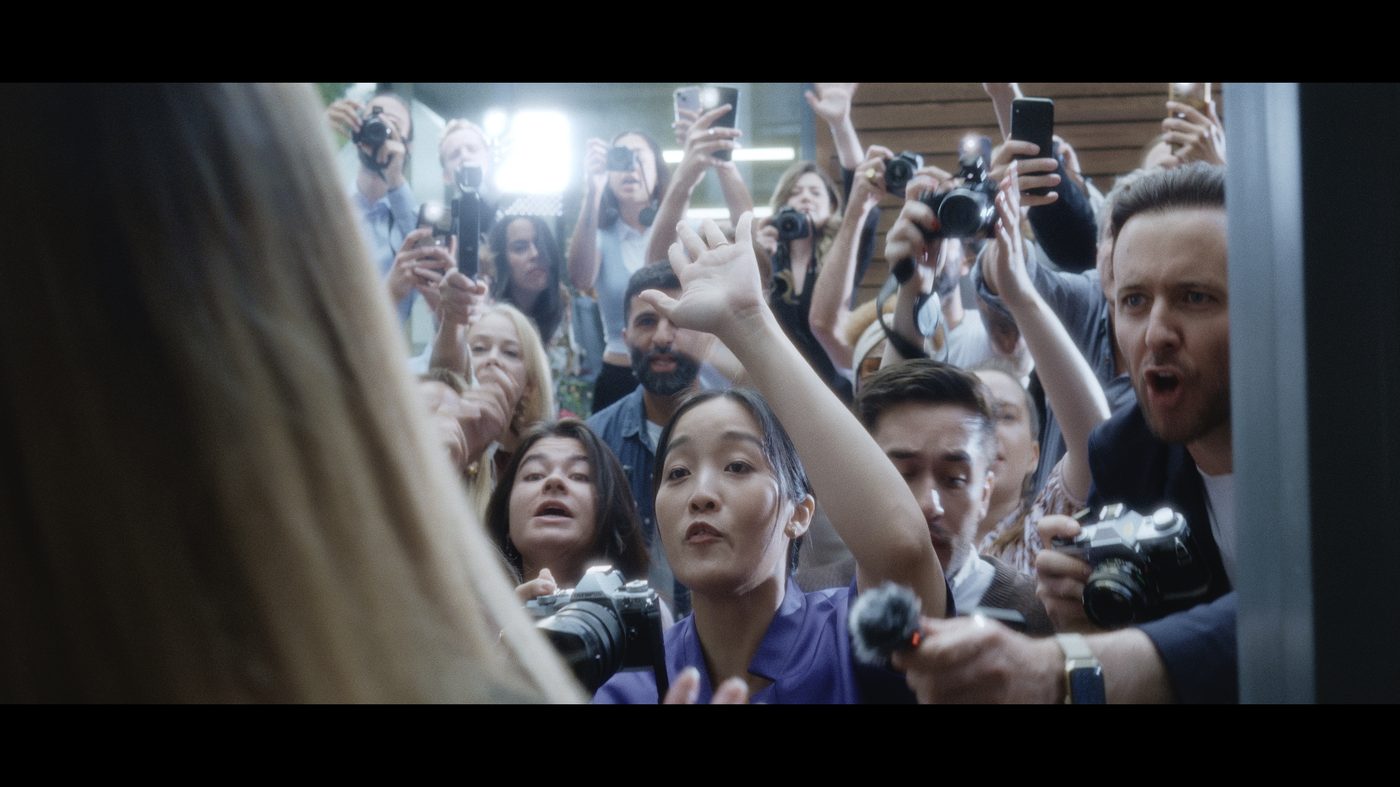 Production still — crowd scene