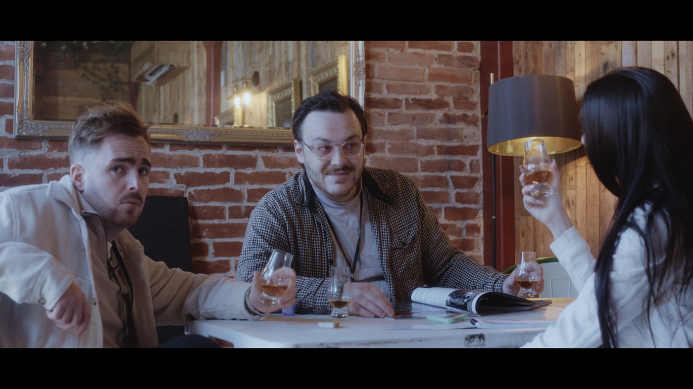 Production still — table read
